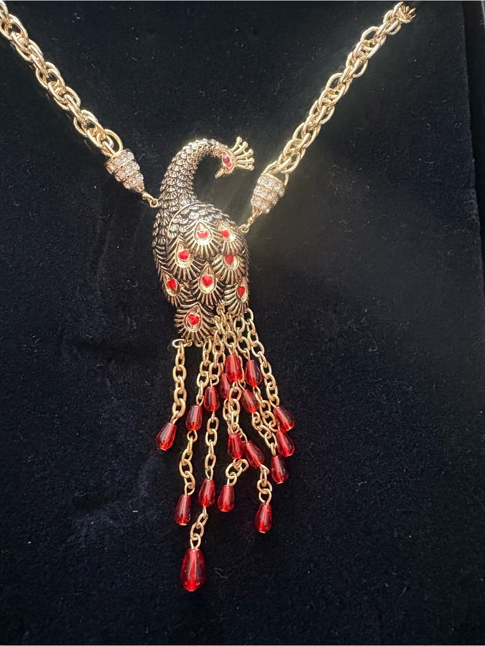 Gold Peacock Pendant Necklace with Red Crystal Drops